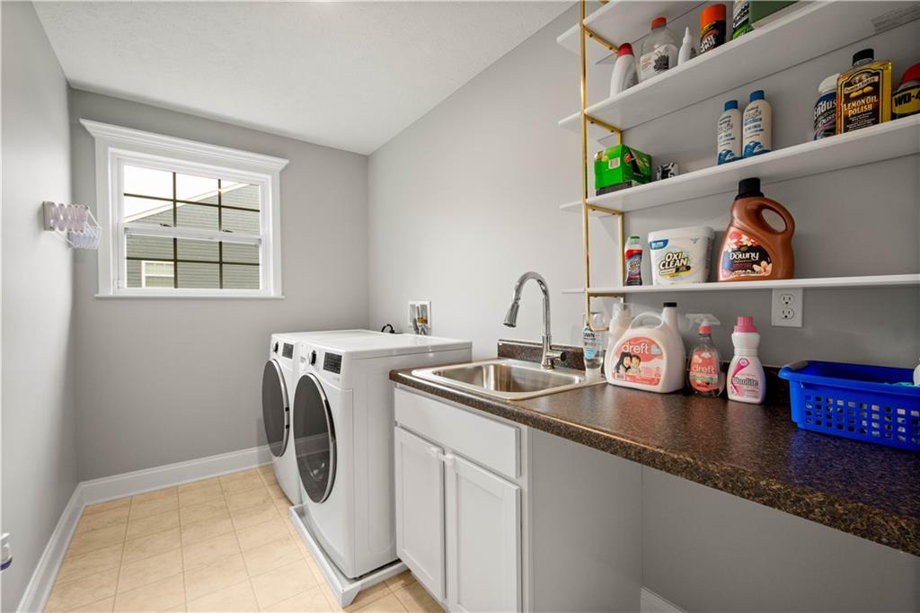 1197 Brook View Court Pittsburgh, PA 15237 - Photo 19 of 30 a utility room with sink dryer and washer