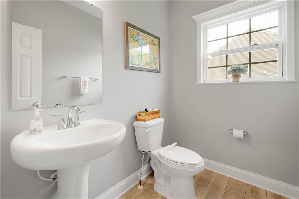 1197 Brook View Court Pittsburgh, PA 15237 - Photo 5 of 30 a bathroom with a sink a toilet and a window