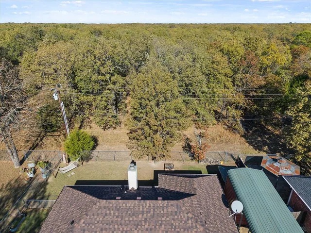 a picture of a cabinet with a white wall