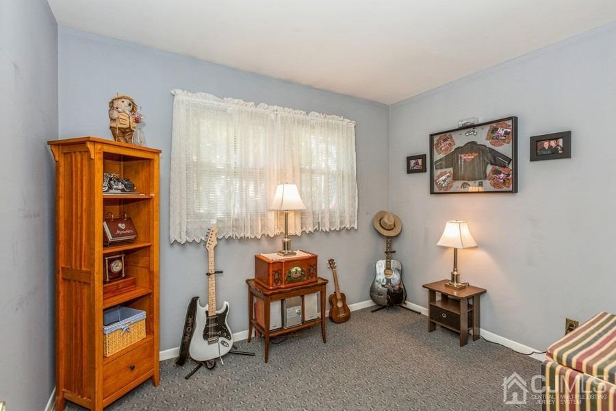 12 New Street Middlesex, NJ 08846 - Photo 11 of 20 a room with furniture and a window