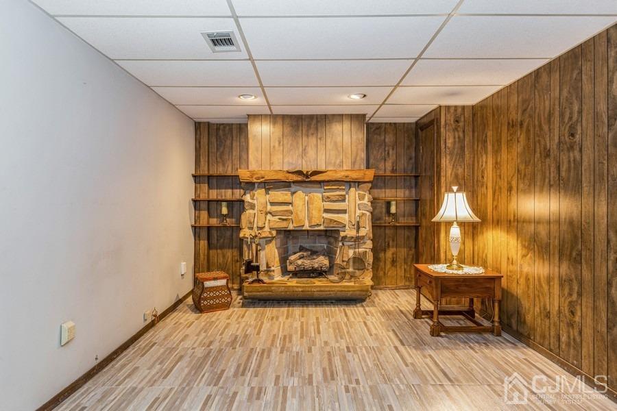 12 New Street Middlesex, NJ 08846 - Photo 14 of 20 a hallway with a bench and a table