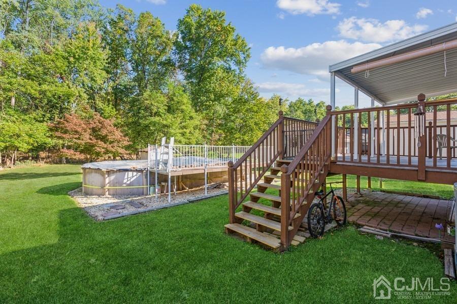 12 New Street Middlesex, NJ 08846 - Photo 16 of 20 a view of a chair and table in the garden
