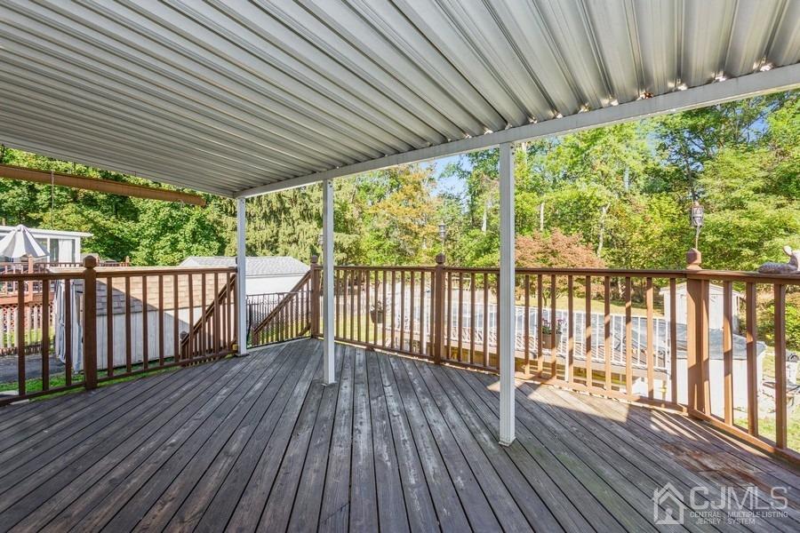 12 New Street Middlesex, NJ 08846 - Photo 17 of 20 a view of porch with wooden floor