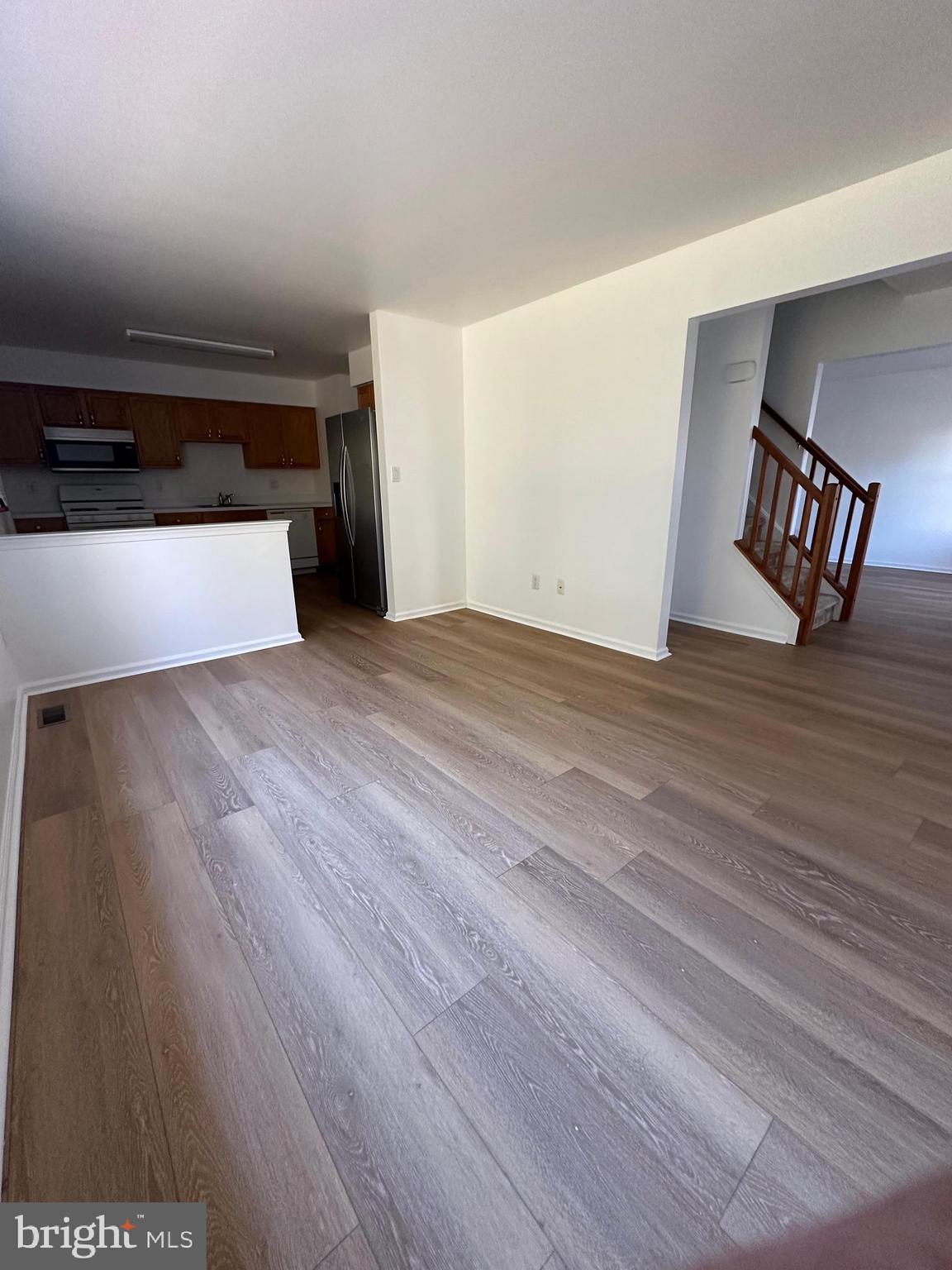 101 Coventry Way Mount Laurel, NJ 08054 - Photo 11 of 31 a view of an empty room with wooden floor and a window