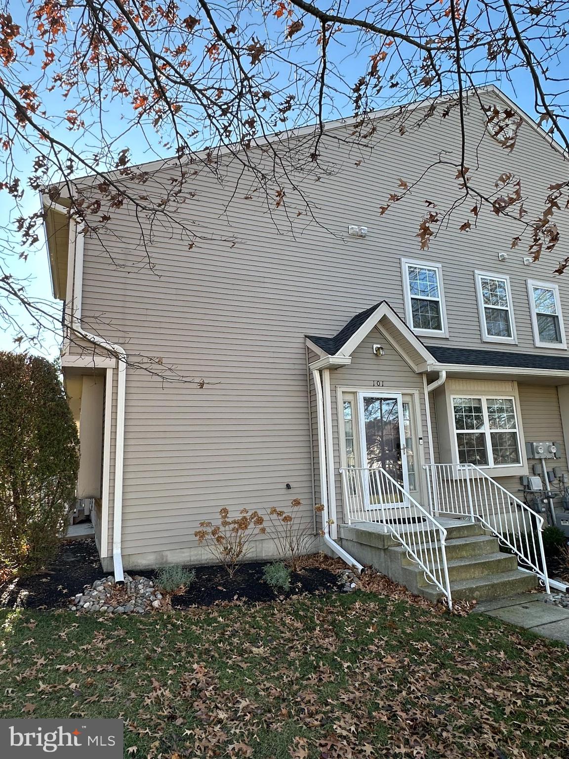 101 Coventry Way Mount Laurel, NJ 08054 - Photo 2 of 31 a front view of a house with a garden
