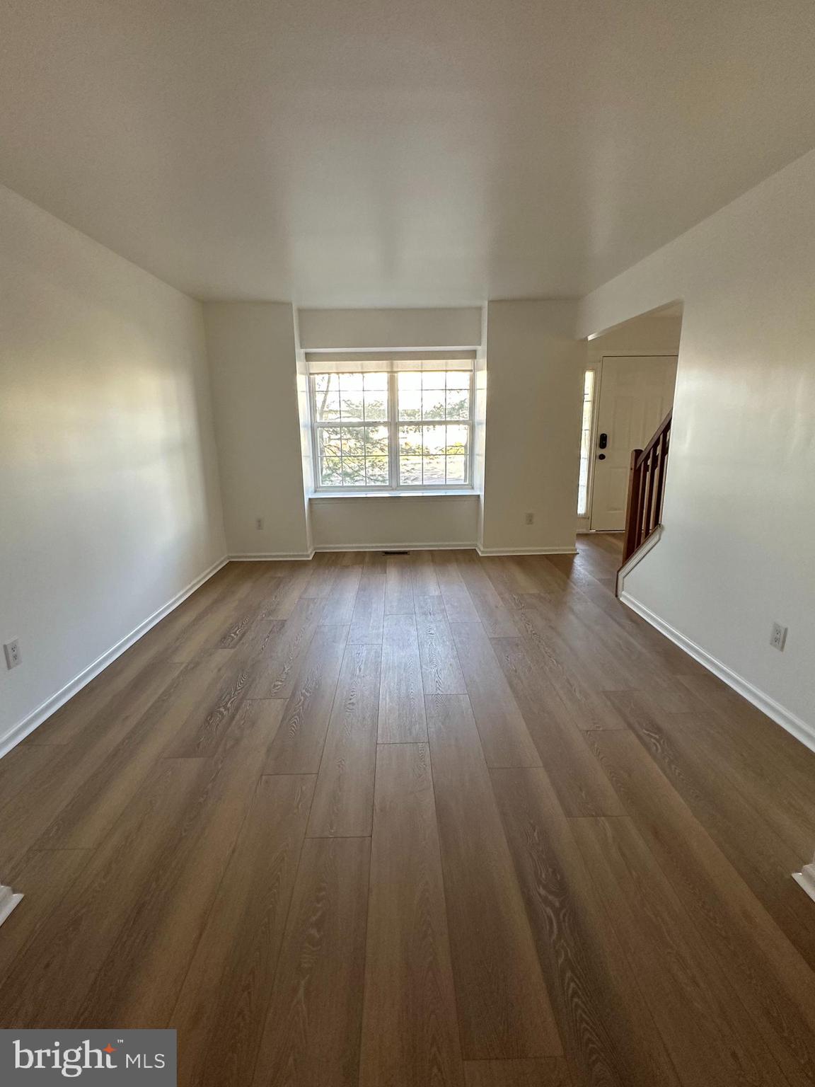 101 Coventry Way Mount Laurel, NJ 08054 - Photo 5 of 31 an empty room with wooden floor and windows