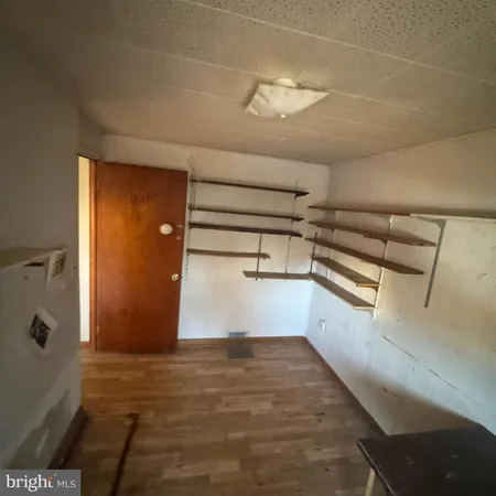 a view of a garage with furniture