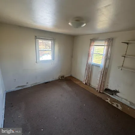 an empty room with a door