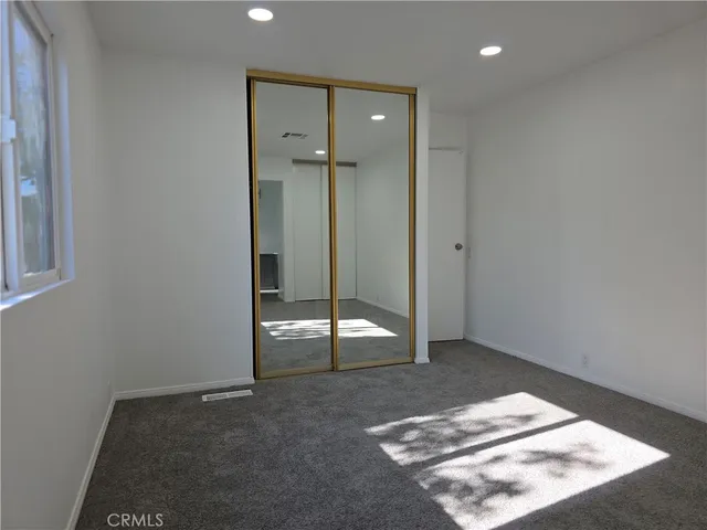 a view of hallway with a large window