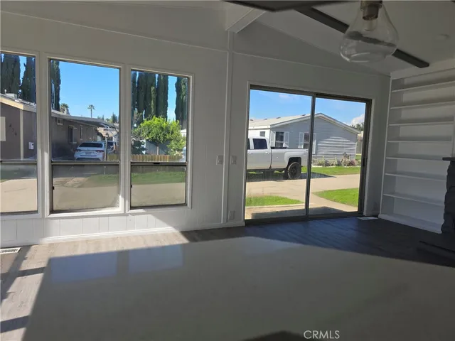 a view of an empty room and window