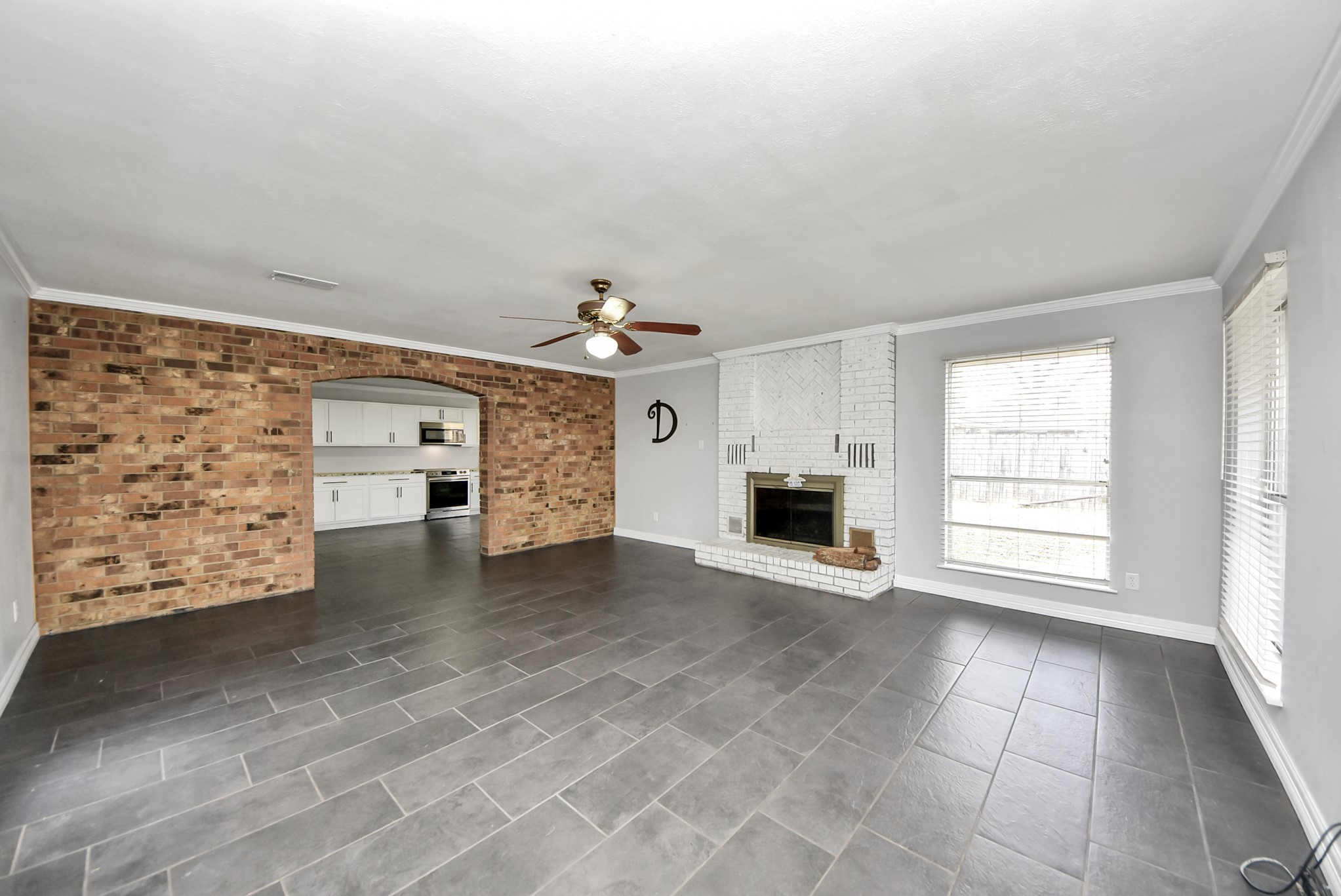 2004 Manor Street Dayton, TX 77535 - Photo 11 of 21 Livingroom complete with a beautiful fireplave