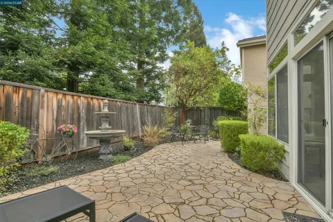 a garden view with a seating space