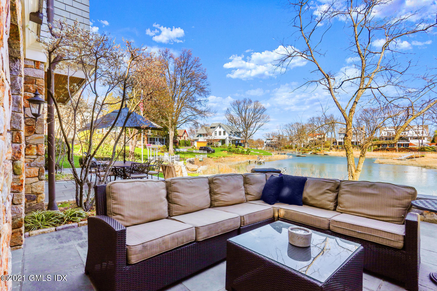 15 Shoal Point Lane Riverside, CT 06878 - Photo 34 of 37 a building outdoor space with patio furniture