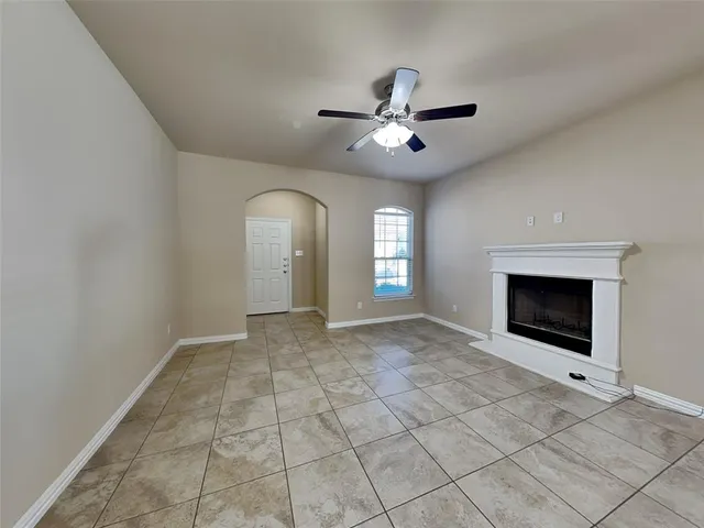 a view of empty room with fan