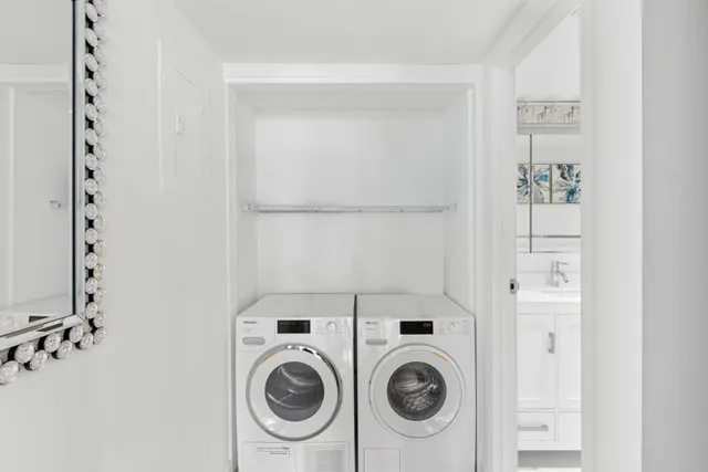 a utility room with dryer and washer