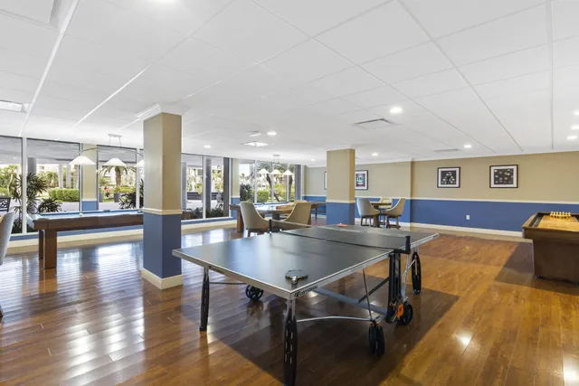 a view of kitchen and dining room with wooden floor