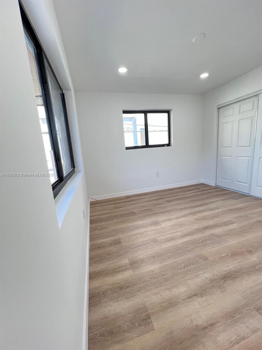 4227 Northwest 5th Street, Unit 8 Miami, FL 33126 - Photo 9 of 12 a view of an empty room