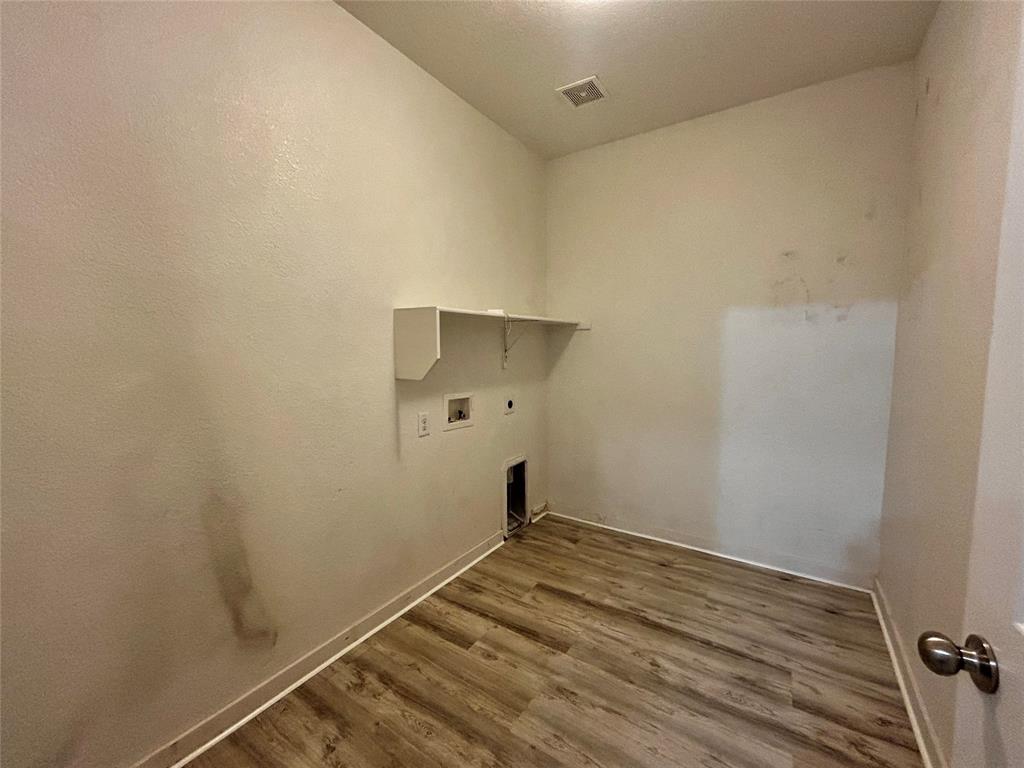 2336 Buelingo Lane Fort Worth, TX 76131 - Photo 21 of 27 a view of a room with wooden floor