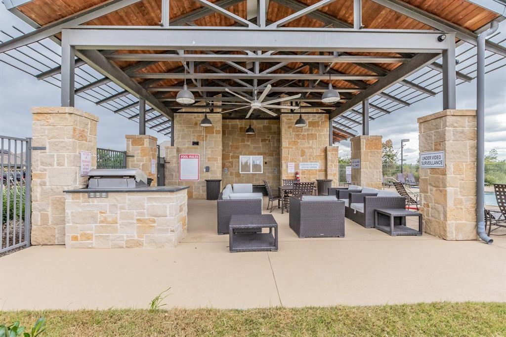2336 Buelingo Lane Fort Worth, TX 76131 - Photo 25 of 27 a living room with furniture and a ceiling fan