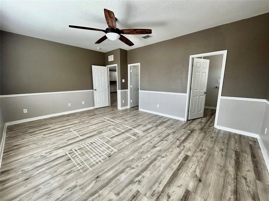 2336 Buelingo Lane Fort Worth, TX 76131 - Photo 10 of 27 a view of a livingroom with wooden floor