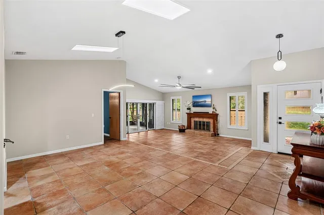 a view of an empty room and window