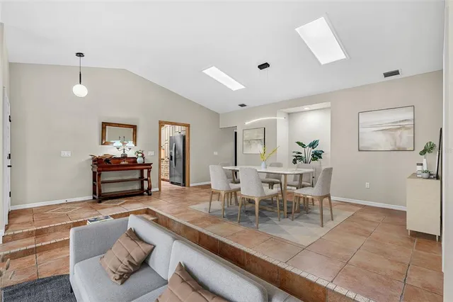 a view of a livingroom with furniture and window