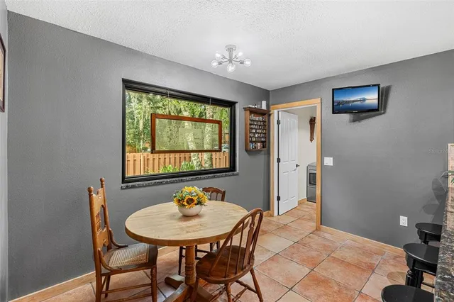a bathroom with a shower and a mirror