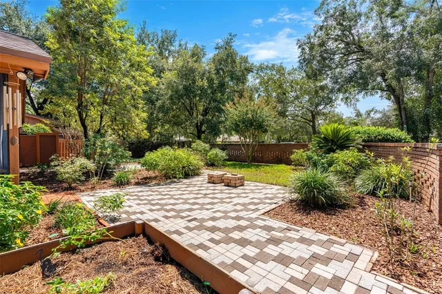a view of a swimming pool with chairs