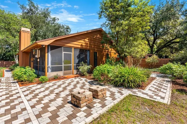 a view of a backyard with a garden