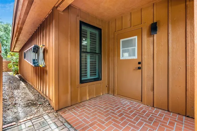 a view of a yard with an outdoor space