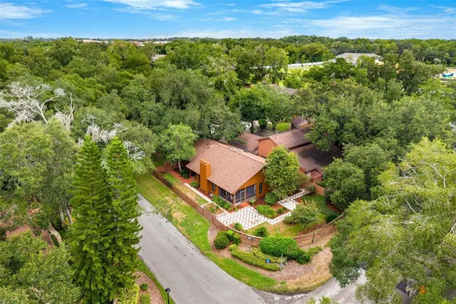 a view of a backyard of the house