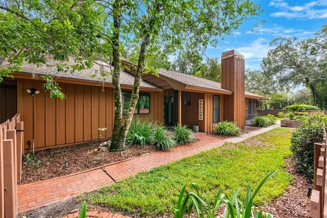 a view of entryway door with wooden floor