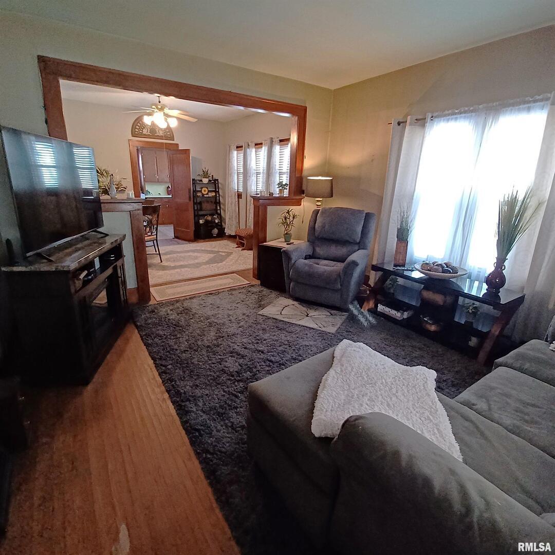 1208 Pine Street Kewanee, IL 61443 - Photo 11 of 36 a living room with furniture and a flat screen tv
