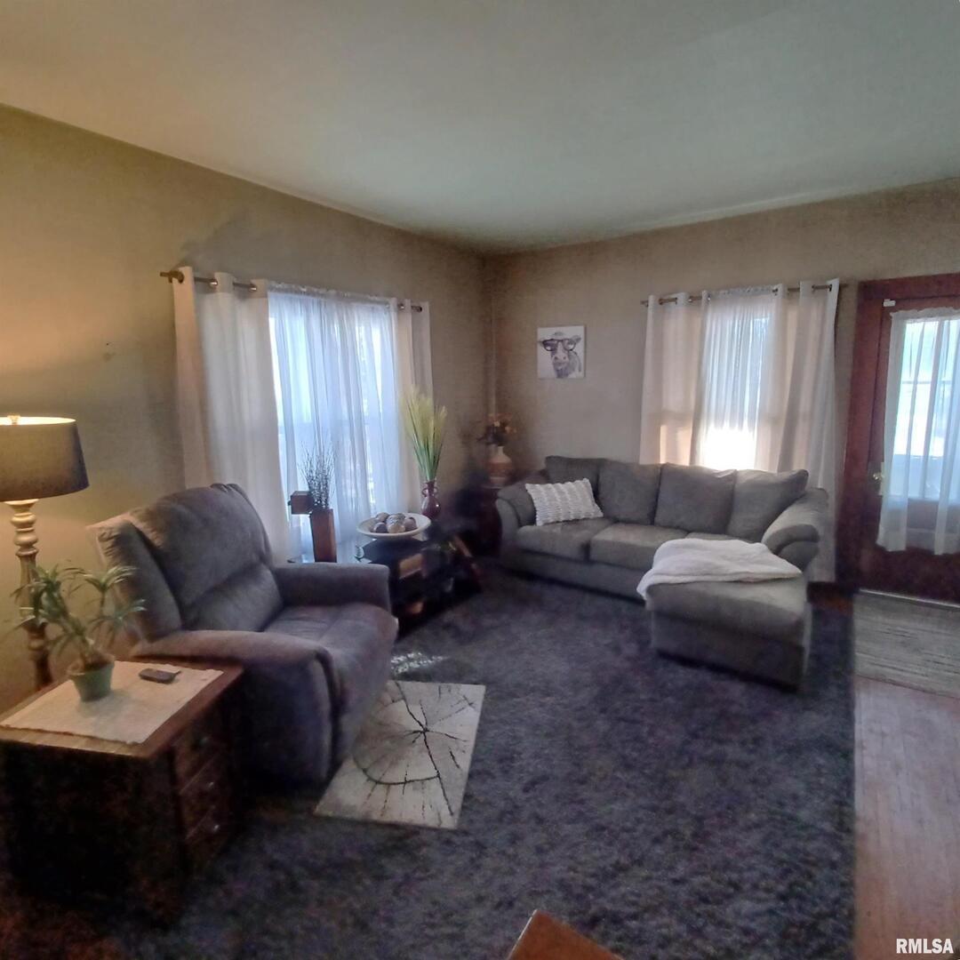 1208 Pine Street Kewanee, IL 61443 - Photo 17 of 36 a living room with furniture and a window
