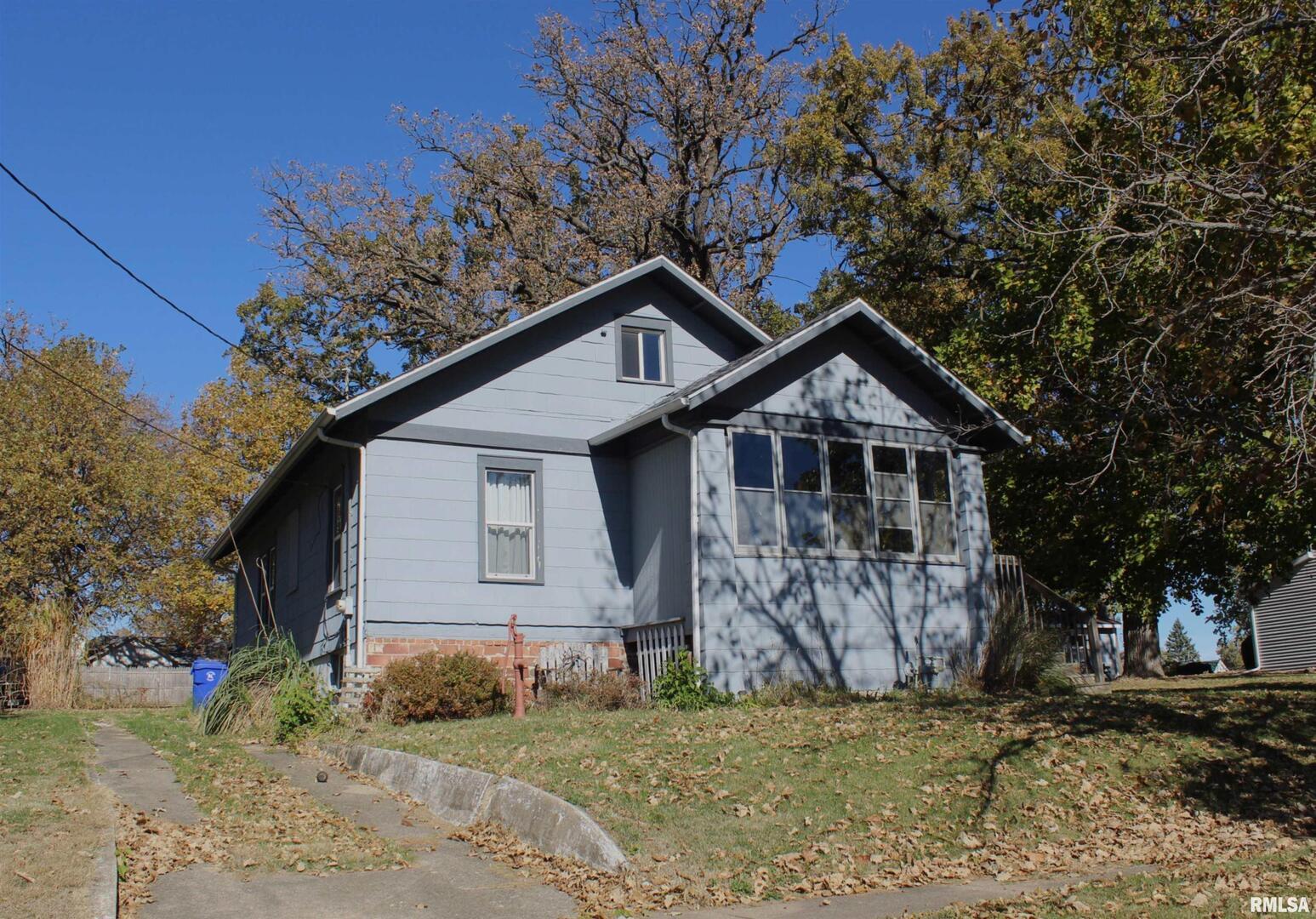 1208 Pine Street Kewanee, IL 61443 - Photo 2 of 36 a front view of a house with a yard