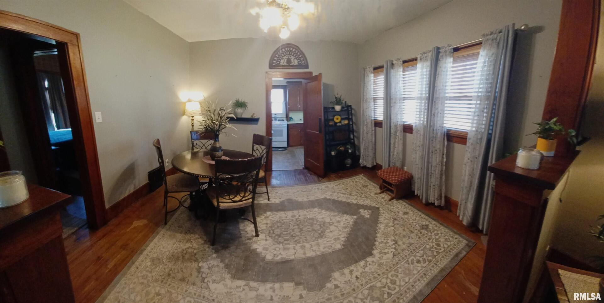 1208 Pine Street Kewanee, IL 61443 - Photo 21 of 36 a living room with furniture and a flat screen tv