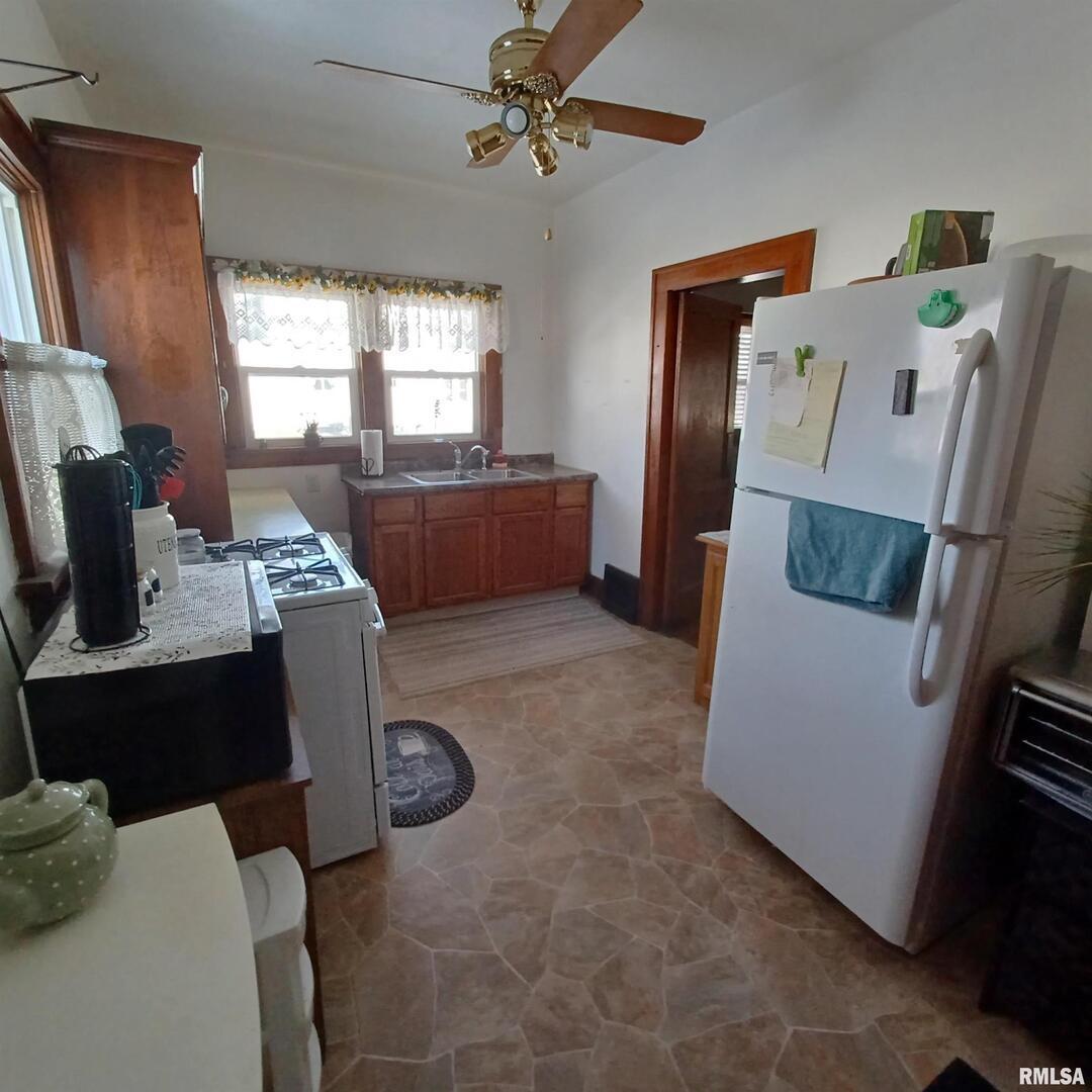 1208 Pine Street Kewanee, IL 61443 - Photo 30 of 36 a living room with furniture and a window