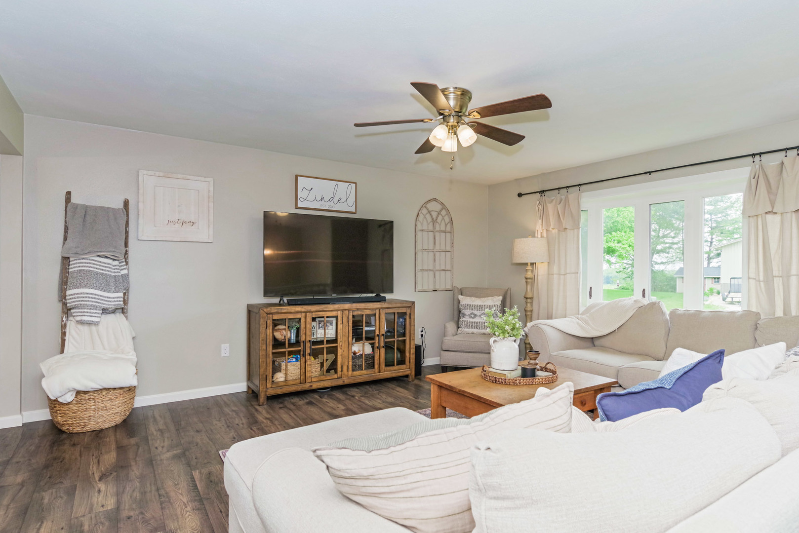 25476 Valley View Road Tremont, IL 61568 - Photo 3 of 45 a living room with furniture and a flat screen tv