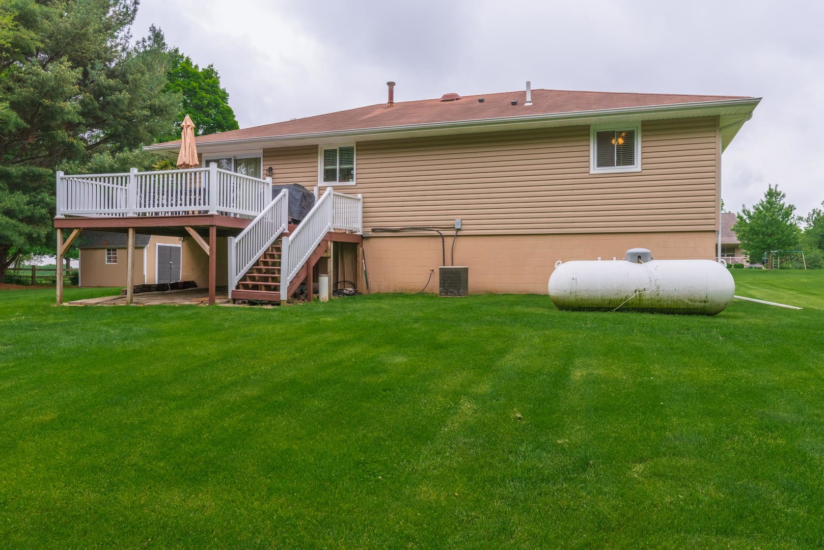 25476 Valley View Road Tremont, IL 61568 - Photo 44 of 45 a front view of a house with garden