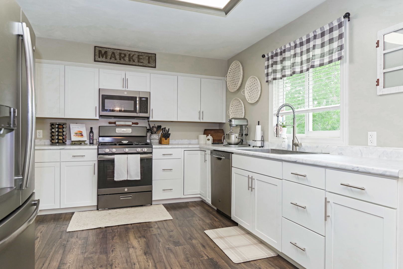 25476 Valley View Road Tremont, IL 61568 - Photo 8 of 45 a kitchen with granite countertop white cabinets and white appliances