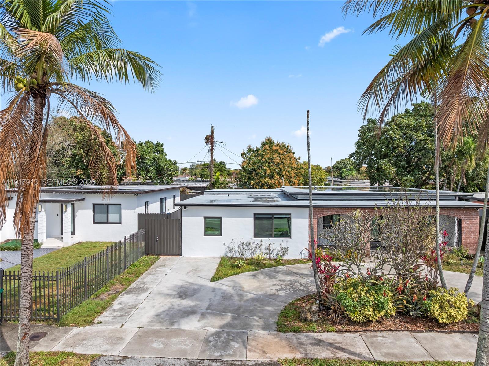161 Southwest 52nd Court, Unit 161 Miami, FL 33134 - Photo 1 of 22 a view of a house with a patio