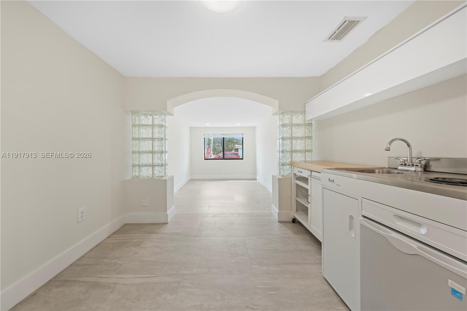 161 Southwest 52nd Court, Unit 161 Miami, FL 33134 - Photo 12 of 22 a view of a kitchen with a sink