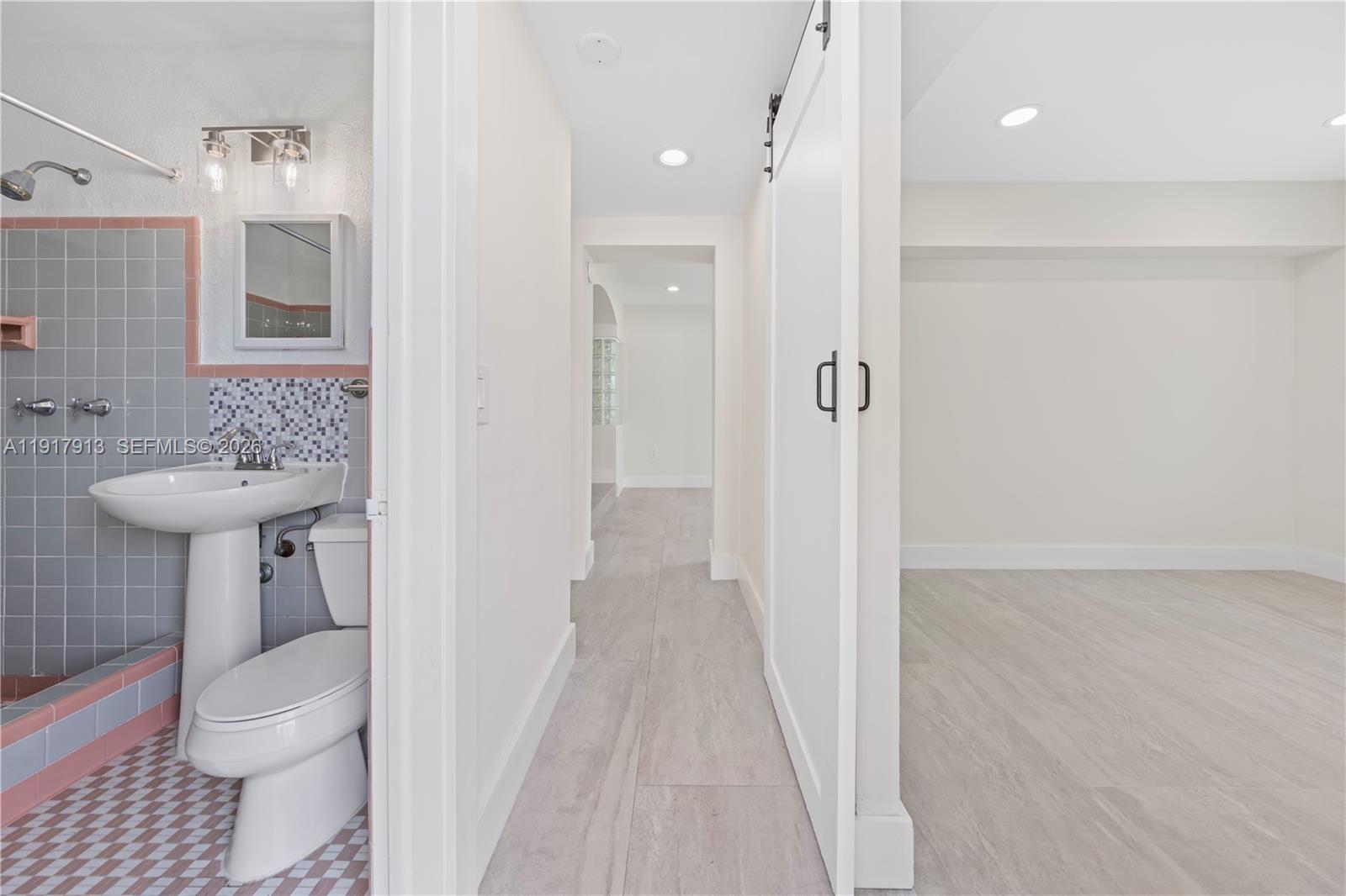 161 Southwest 52nd Court, Unit 161 Miami, FL 33134 - Photo 15 of 22 a bathroom with a sink toilet and shower