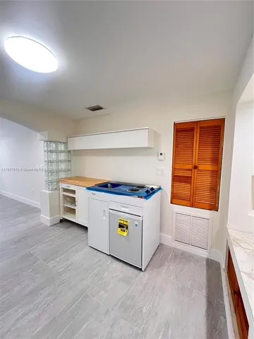 a utility room with washer and dryer