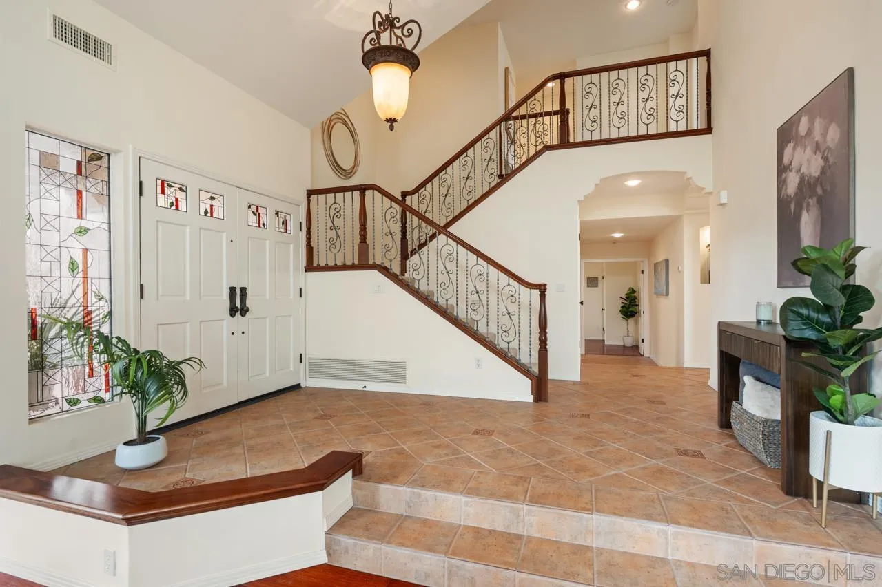 10235 Rue Chamberry San Diego, CA 92131 - Photo 15 of 72 a view of entryway and hall with wooden floor
