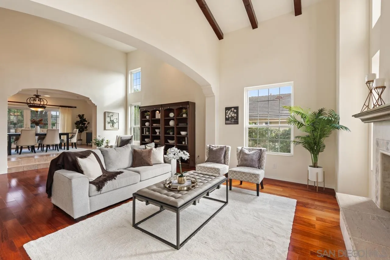 10235 Rue Chamberry San Diego, CA 92131 - Photo 20 of 72 a living room with furniture and wooden floor