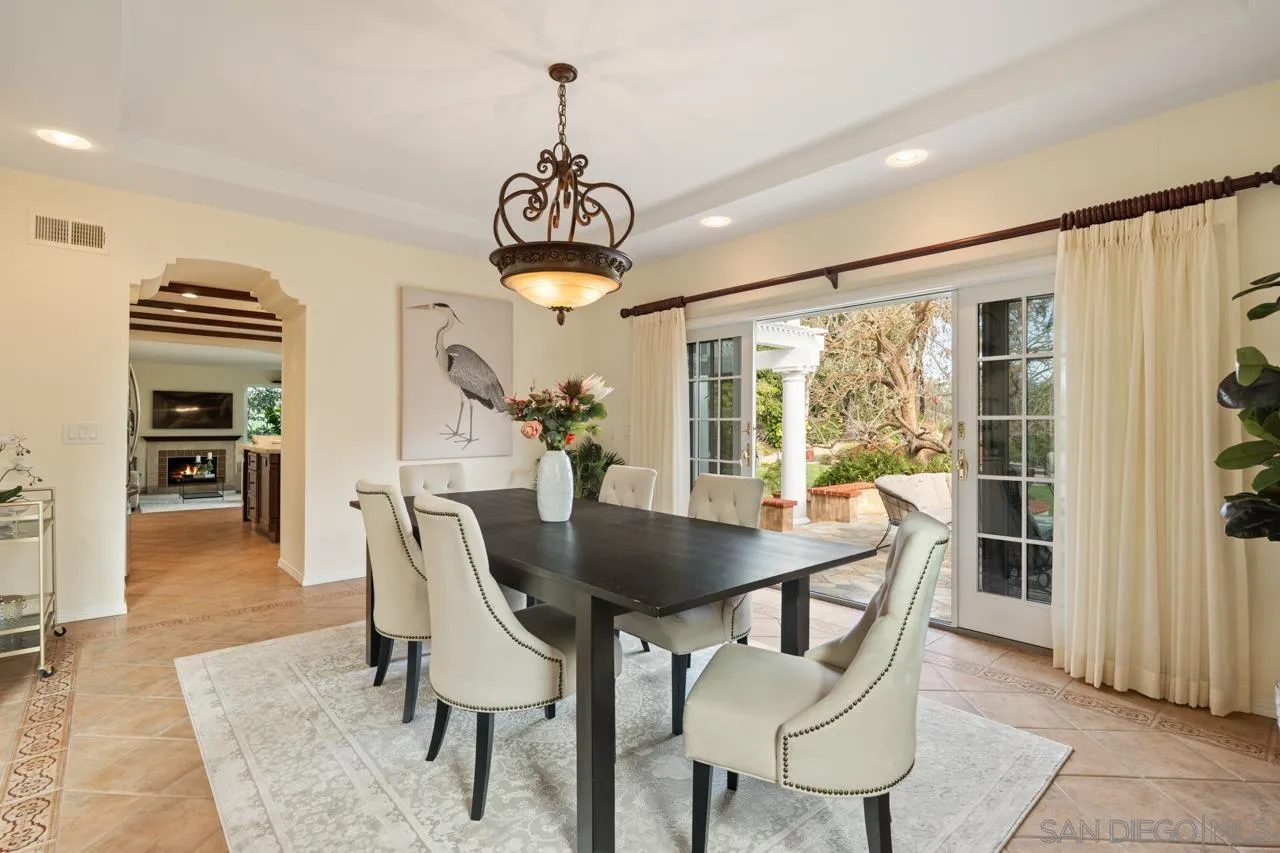 10235 Rue Chamberry San Diego, CA 92131 - Photo 21 of 72 a view of a dining room with furniture window and wooden floor