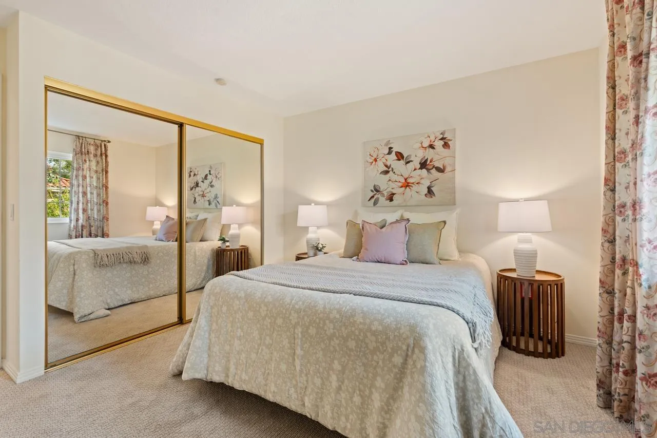 10235 Rue Chamberry San Diego, CA 92131 - Photo 43 of 72 a bedroom with a large bed and a large window