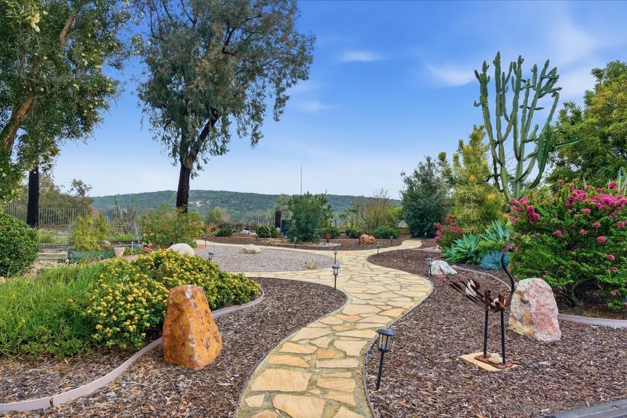 10235 Rue Chamberry San Diego, CA 92131 - Photo 55 of 72 a view of a yard with an outdoor space