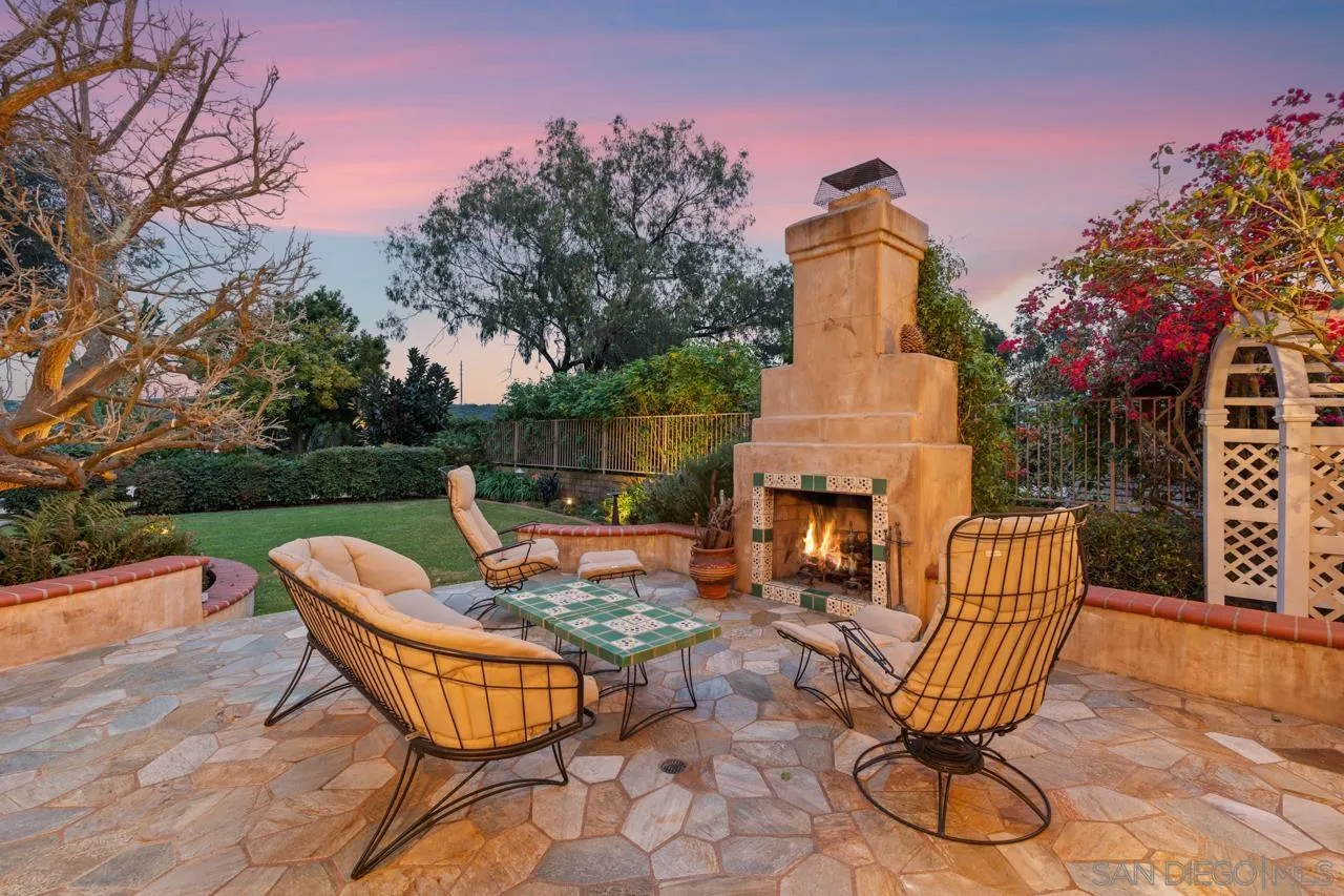 10235 Rue Chamberry San Diego, CA 92131 - Photo 6 of 72 a view of a patio with couches table and chairs and potted plants
